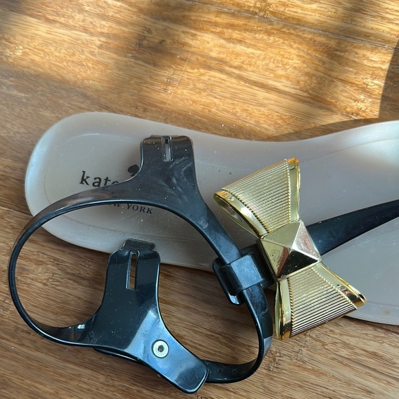 Kate Spade Black and Gold Bow Jelly Sandals - Picture 2 of 5